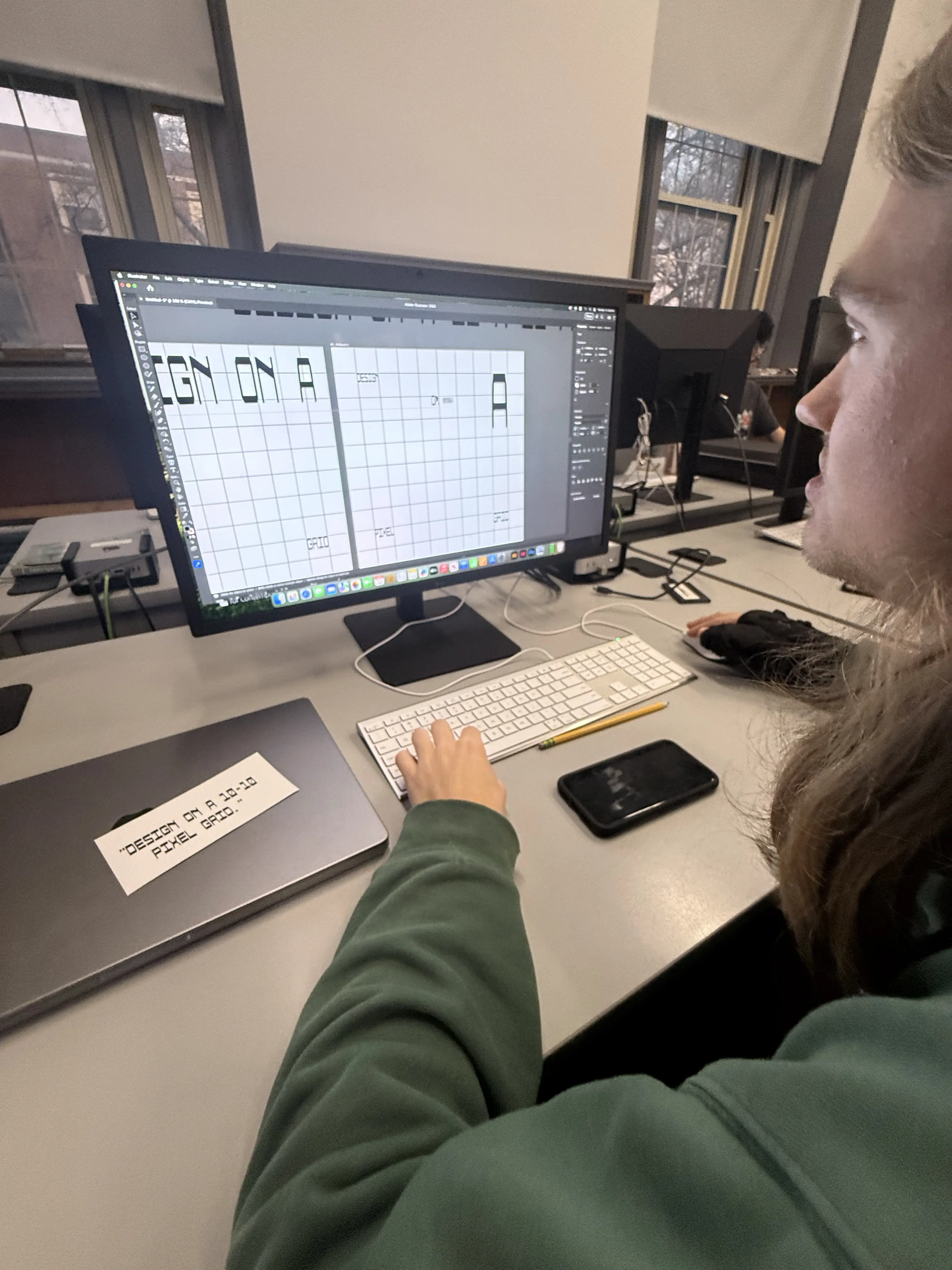 Participant designing on a large monitor