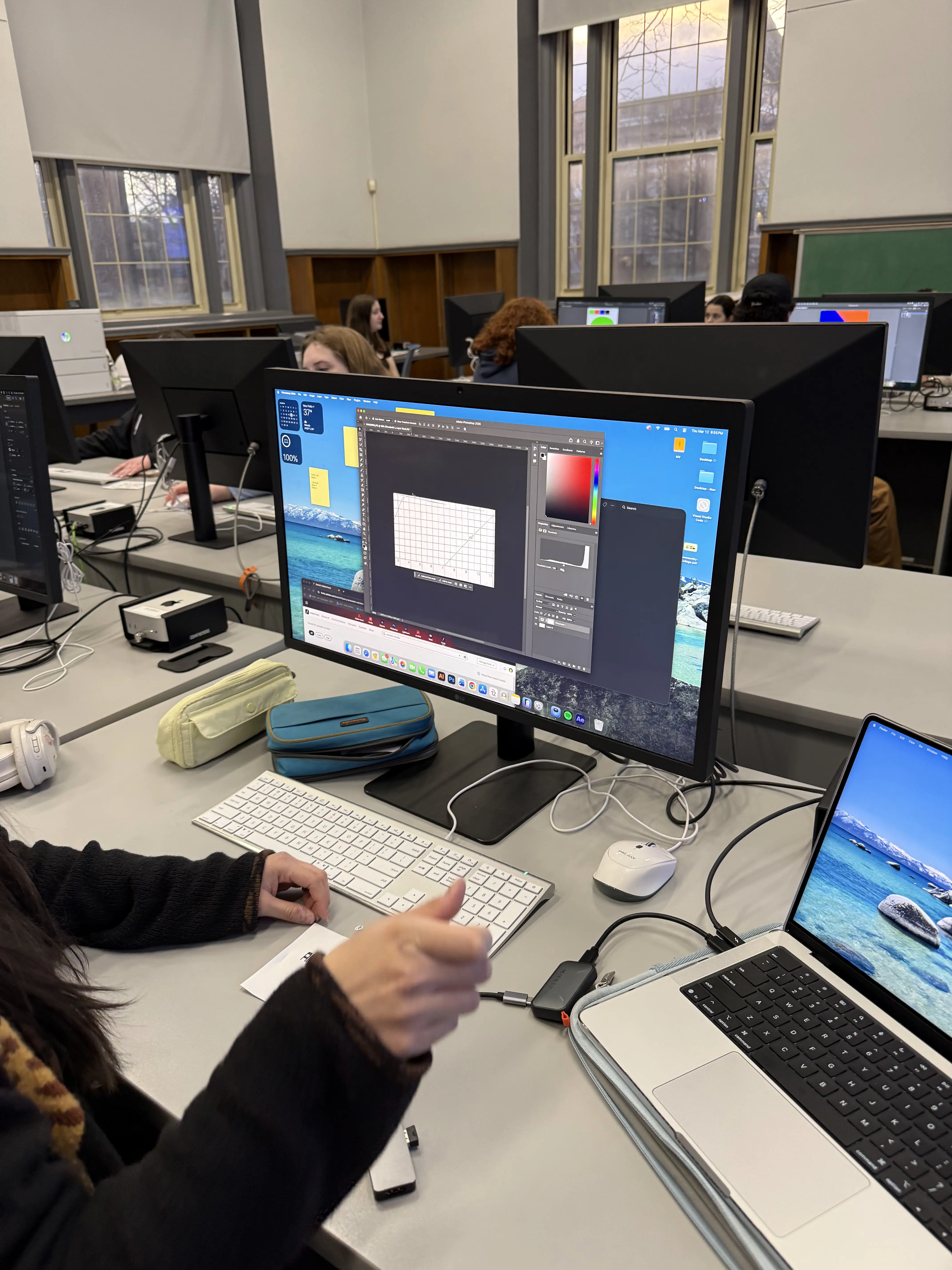 Participant using Photoshop during the workshop